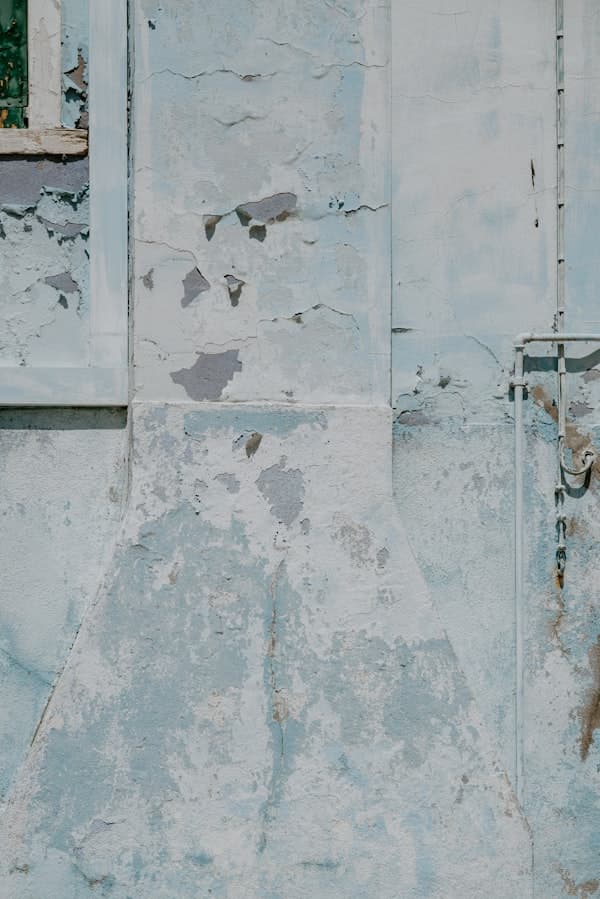 Paint peeling near window